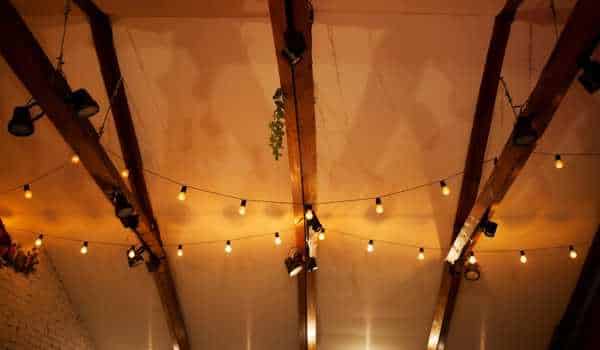 Rope lights shine on the ceiling