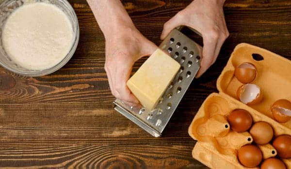 How do I use a grater effectively