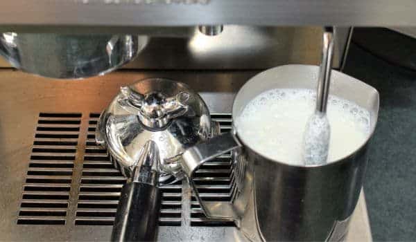 Steps to Froth Milk with a Whisk